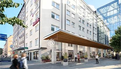 Entré till fastrigheten Ringvägen 100